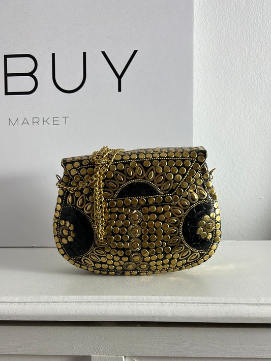 OTRAS. Bolso mini rígido dorado (tara)