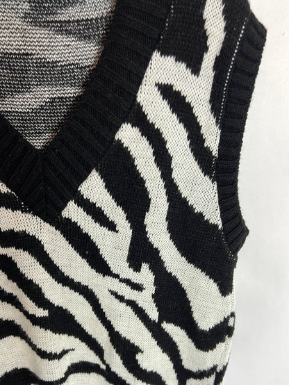 OTRAS. Chaleco estampado cebra.T.u(s/m)