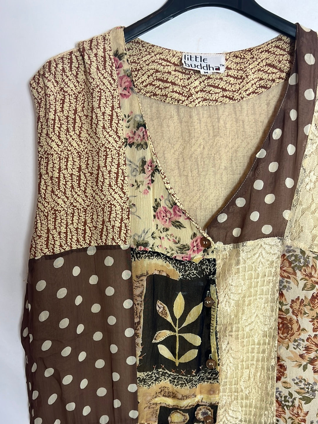 LITTLE BUDDHA. Textured print vest. TM