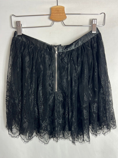 H&amp;M. Short black lace skirt. Size 38