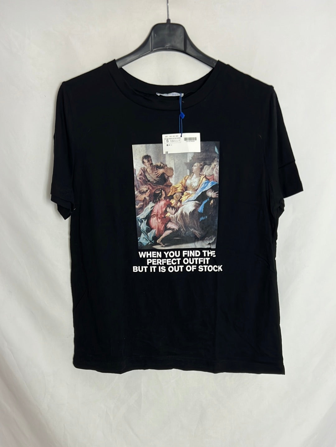 ZARA. Camiseta negra dibujos. T S