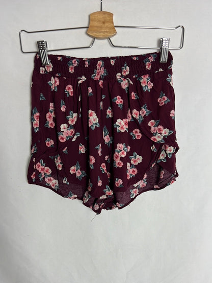 PULL & BEAR. Short fluido apertura laterales T.40