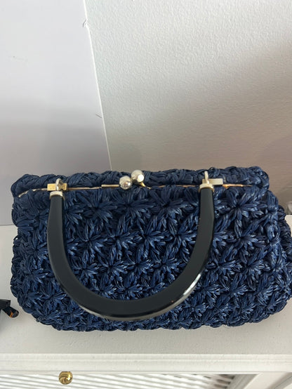 OTRAS. Bolso flores croché