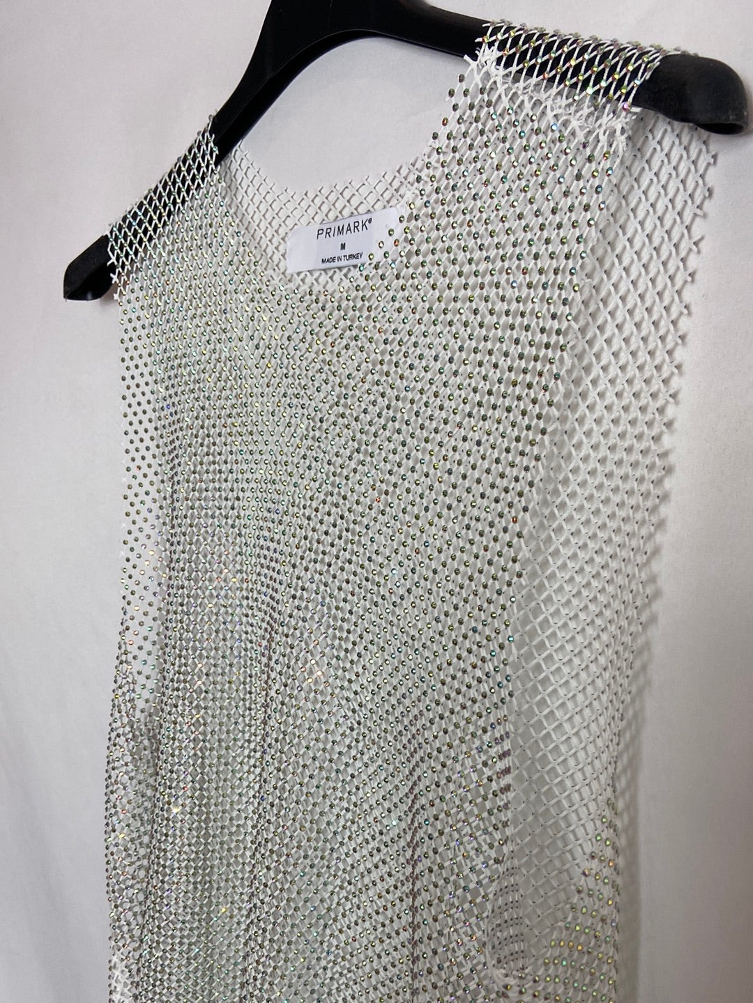 PRIMARK. Top rejilla pedrería T.M