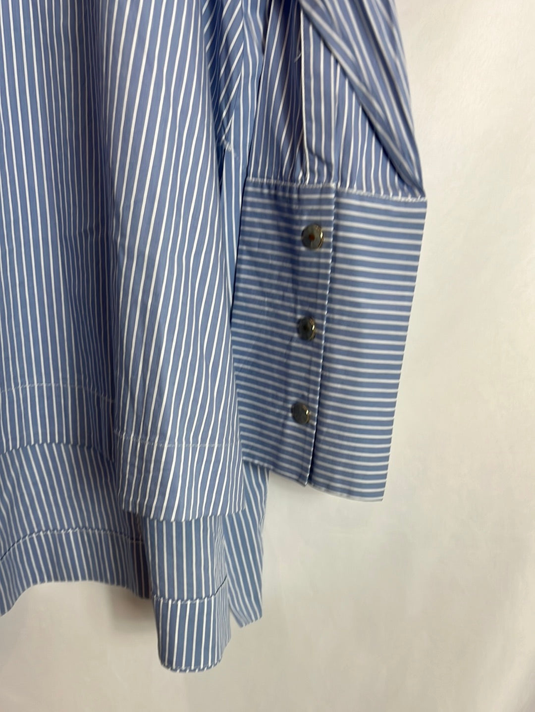 ZARA. Asymmetrical blue striped blouse. Size XL