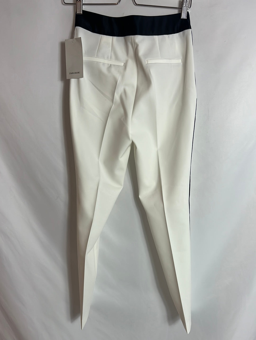 ZARA. White trousers with black stripes on the sides. XS