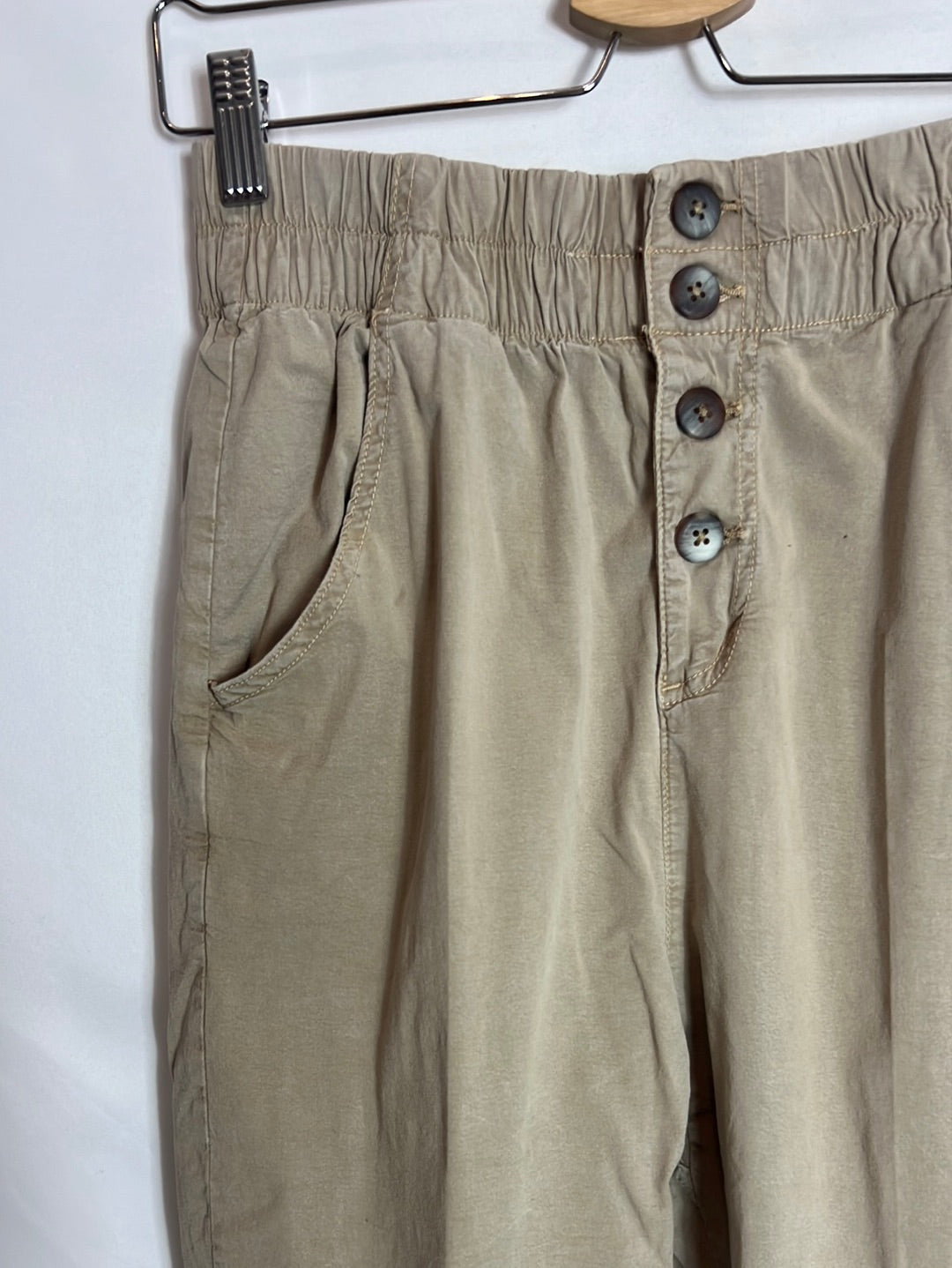 OTHER. Beige slouchy button-down pants. TS