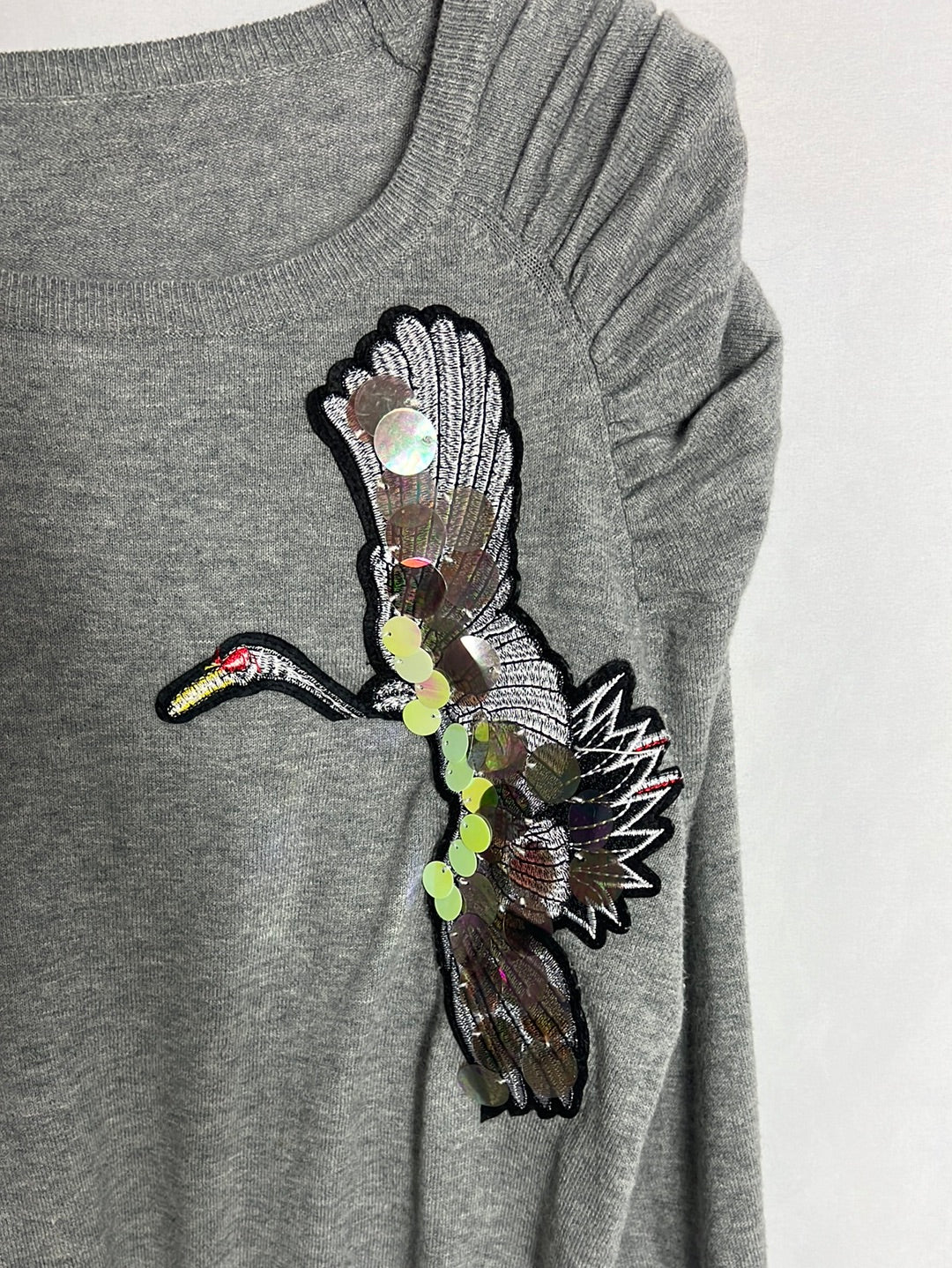 OTRAS. Jersey gris manga abullonada pájaro. T M