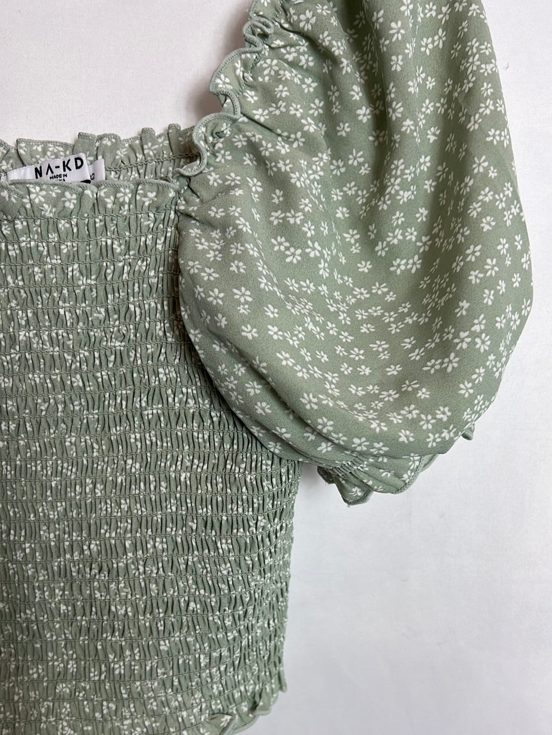 NA-KD. Croptop nido abeja verde flores T.32