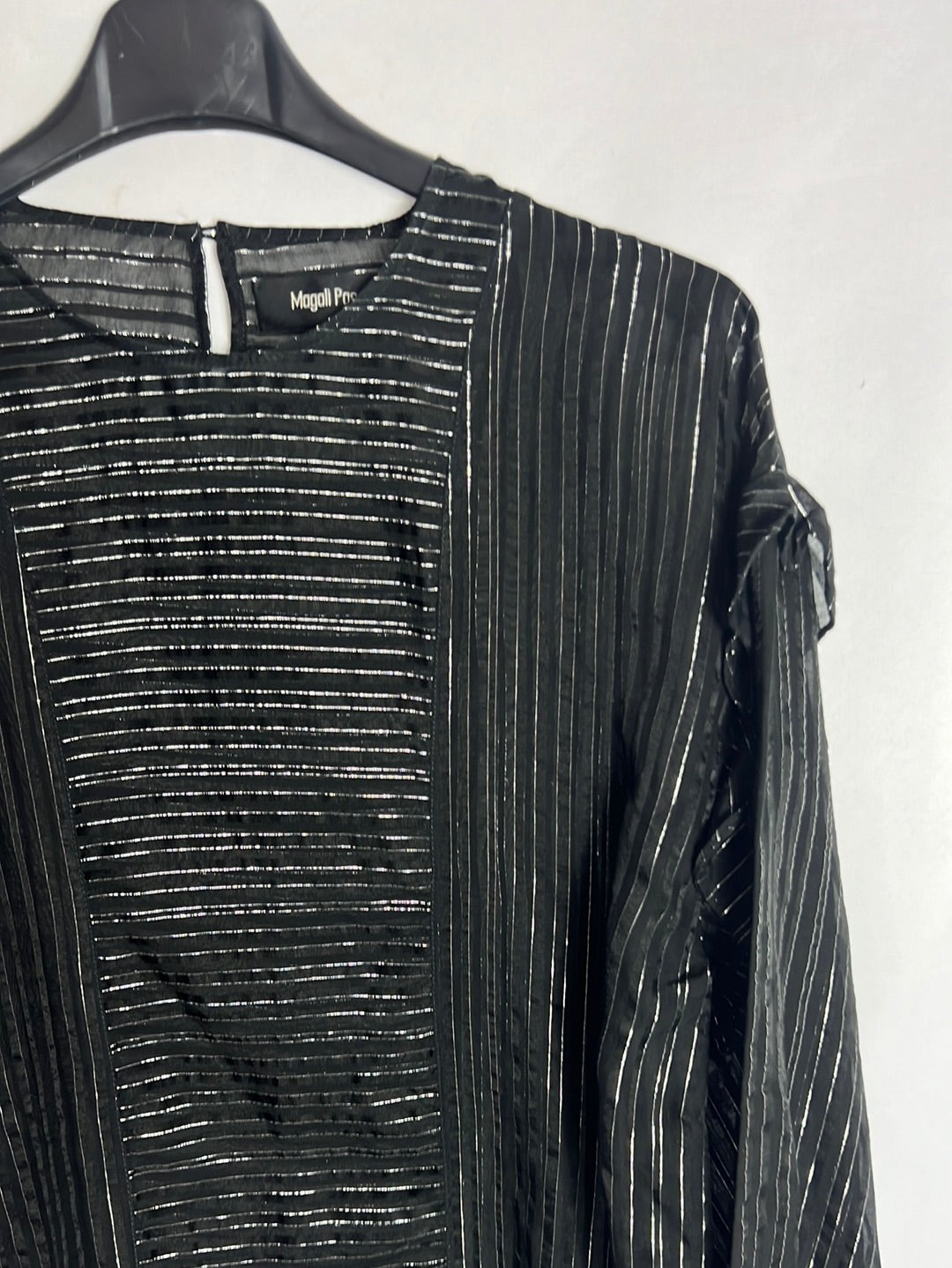 MAGALI PASCAL. Semi-sheer black blouse with silver threads. TS