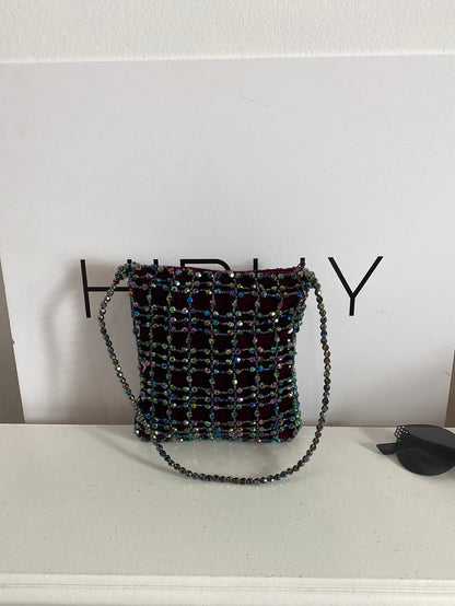 MANGO. Burgundy handbag with rhinestones