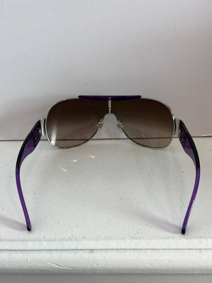 CHANEL. Purple-rimmed glasses