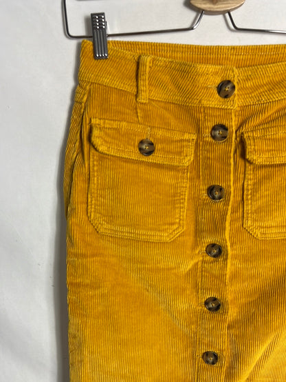 C&A. Falda pana mostaza abotonada. T 36