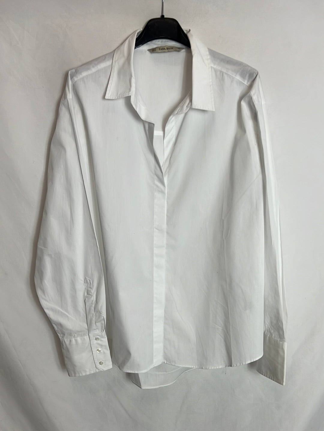 ZARA. Blusa blanca asimétrica. T XL
