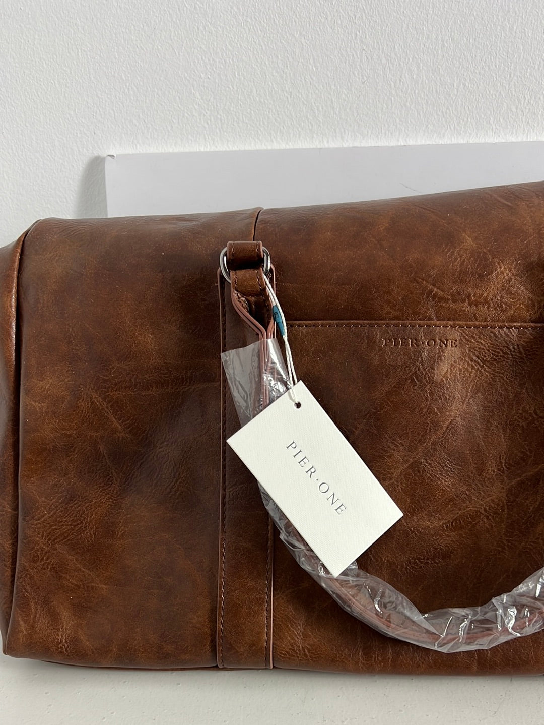 PIER ONE. Faux leather travel bag