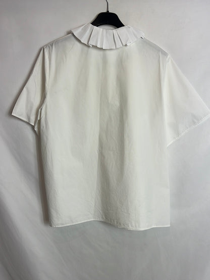 COS. Blusa blanca oversized detalle cuello. T M