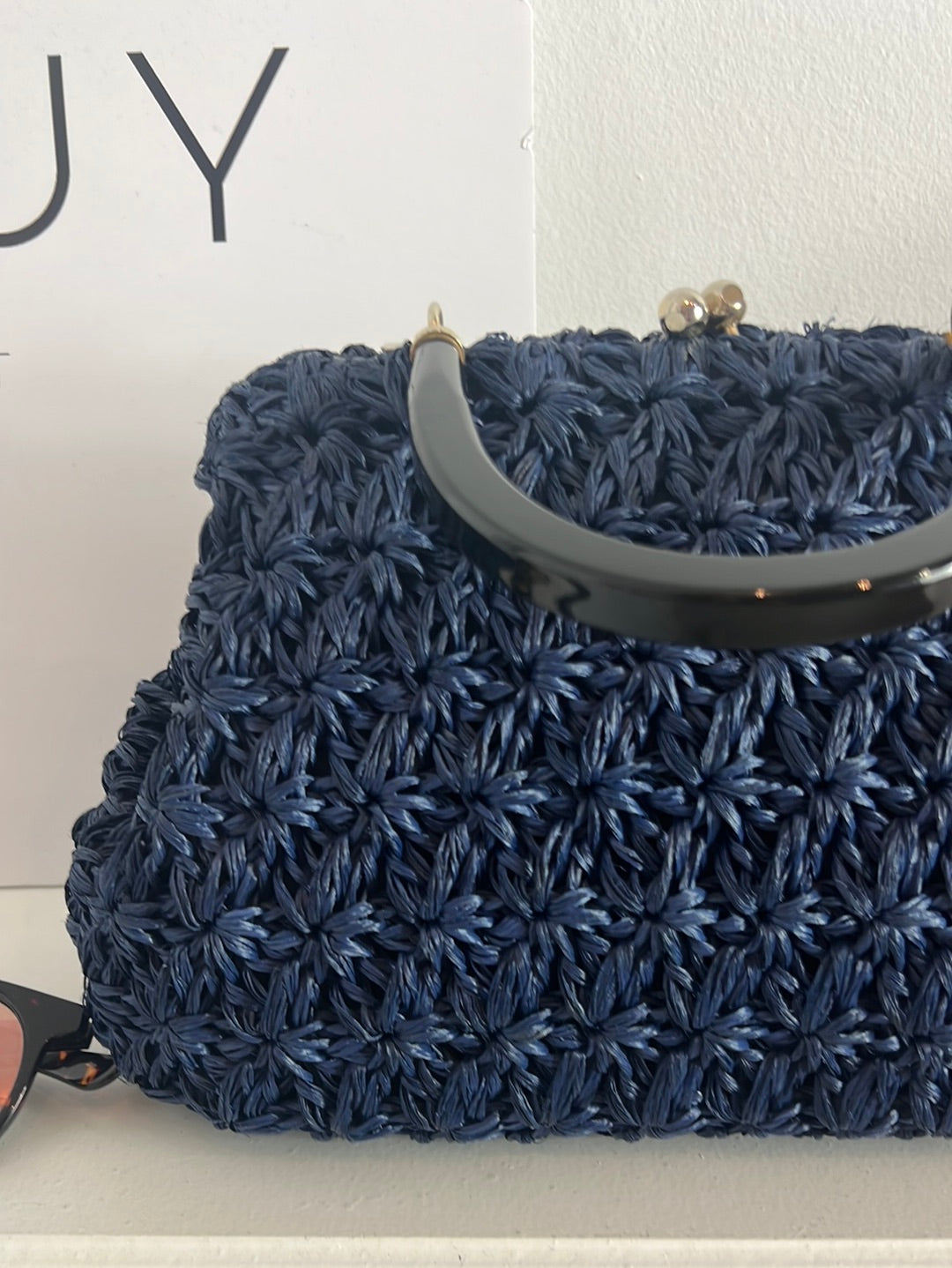 OTRAS. Bolso flores croché