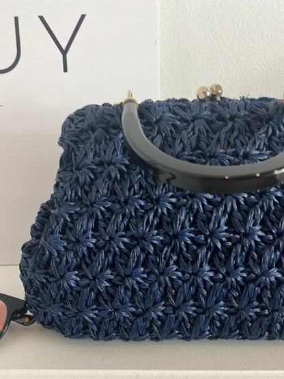 OTRAS. Bolso flores croché