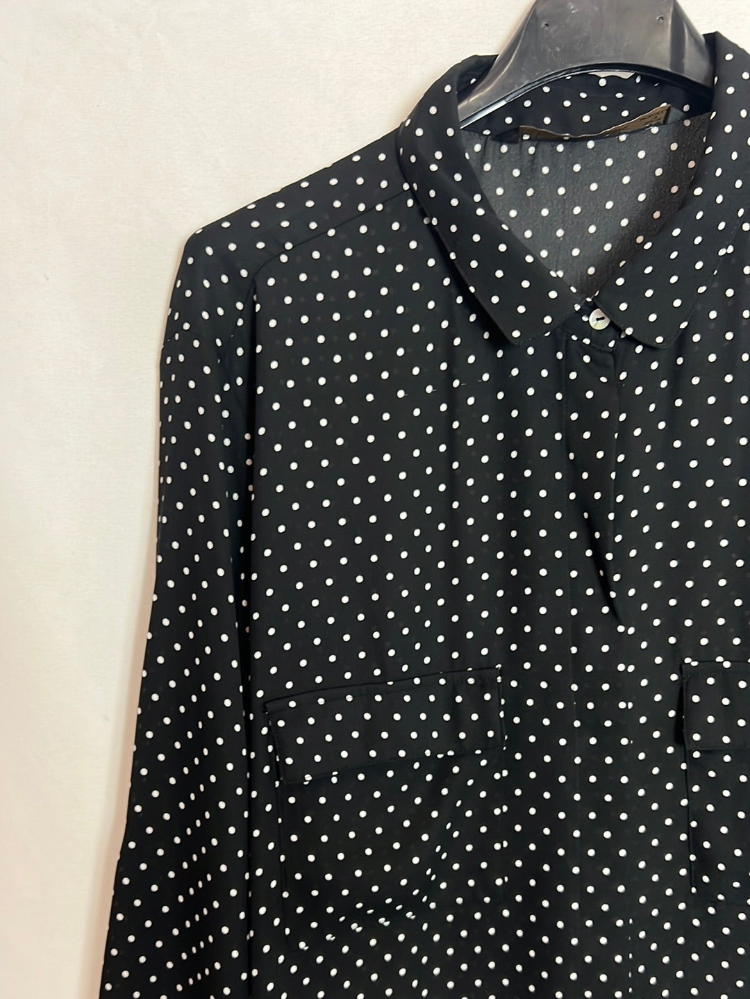 ZARA. Black blouse with white polka dots and pockets. Size XL