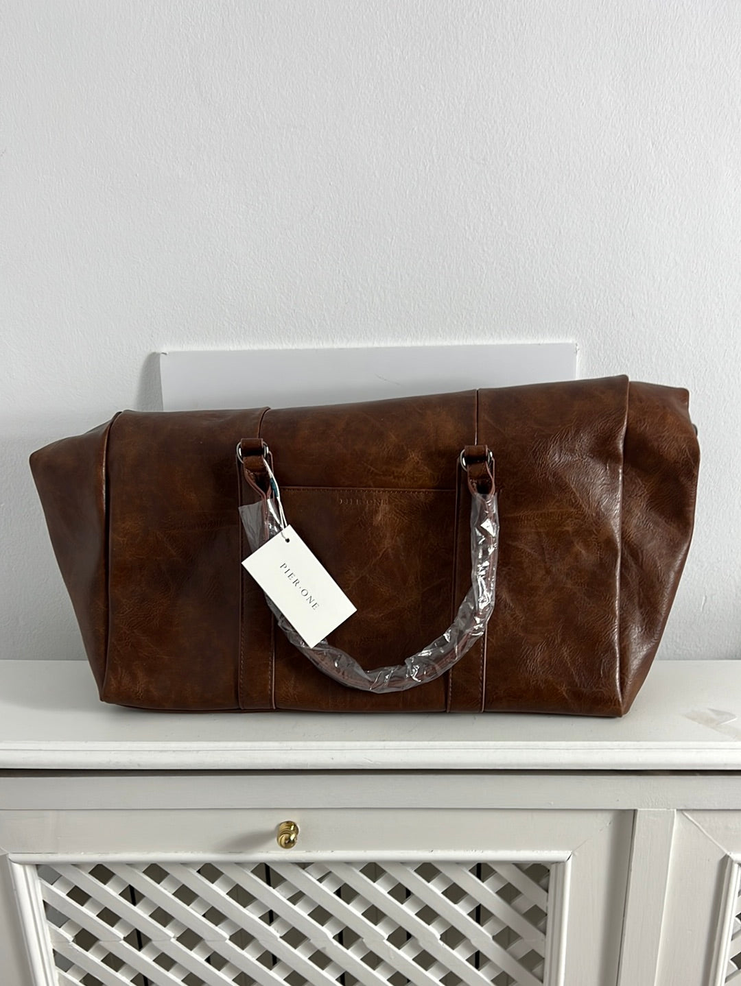 PIER ONE. Faux leather travel bag