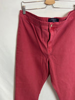 VIOLETA BY MANGO. Pantalones pitillo rojo efecto desgastado. T 50