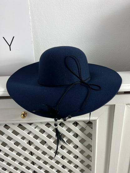 OTHERS. Blue hat with feather detail. T 57