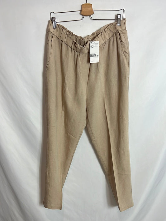 H&amp;M. Beige linen-effect flowing trousers. Size 46
