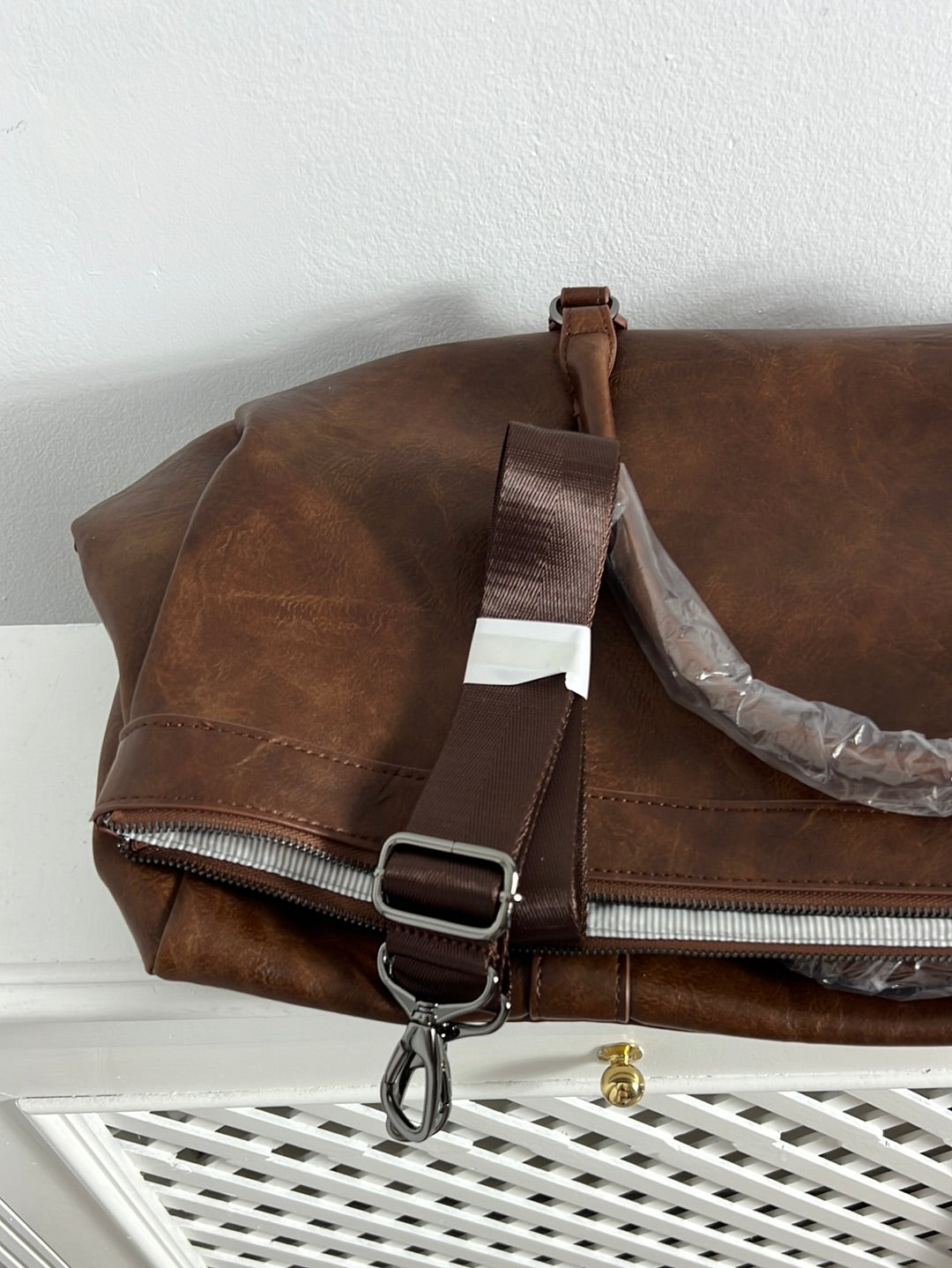 PIER ONE. Faux leather travel bag