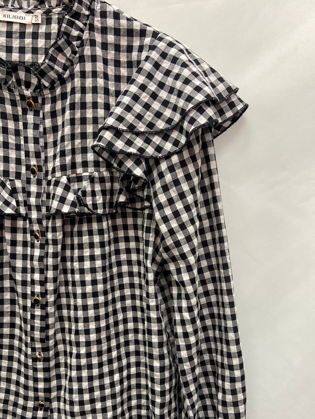 KILIBBI.Blusa cuadros volantes T.S/M