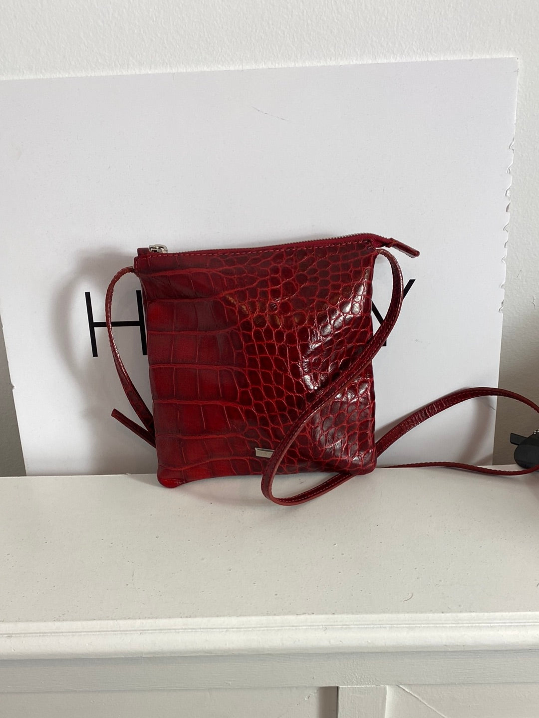 COCCINELLE. Red leather shoulder bag