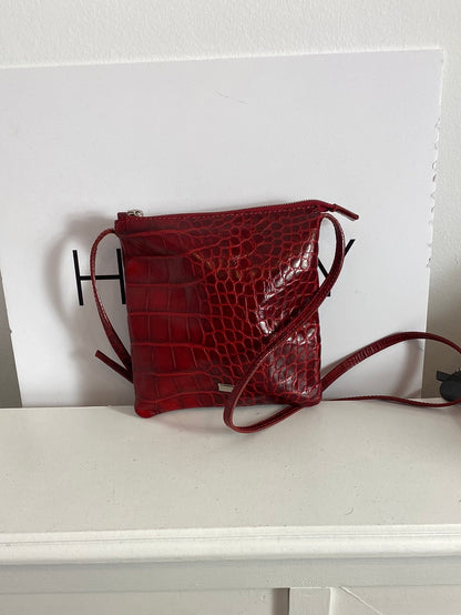 COCCINELLE. Red leather shoulder bag