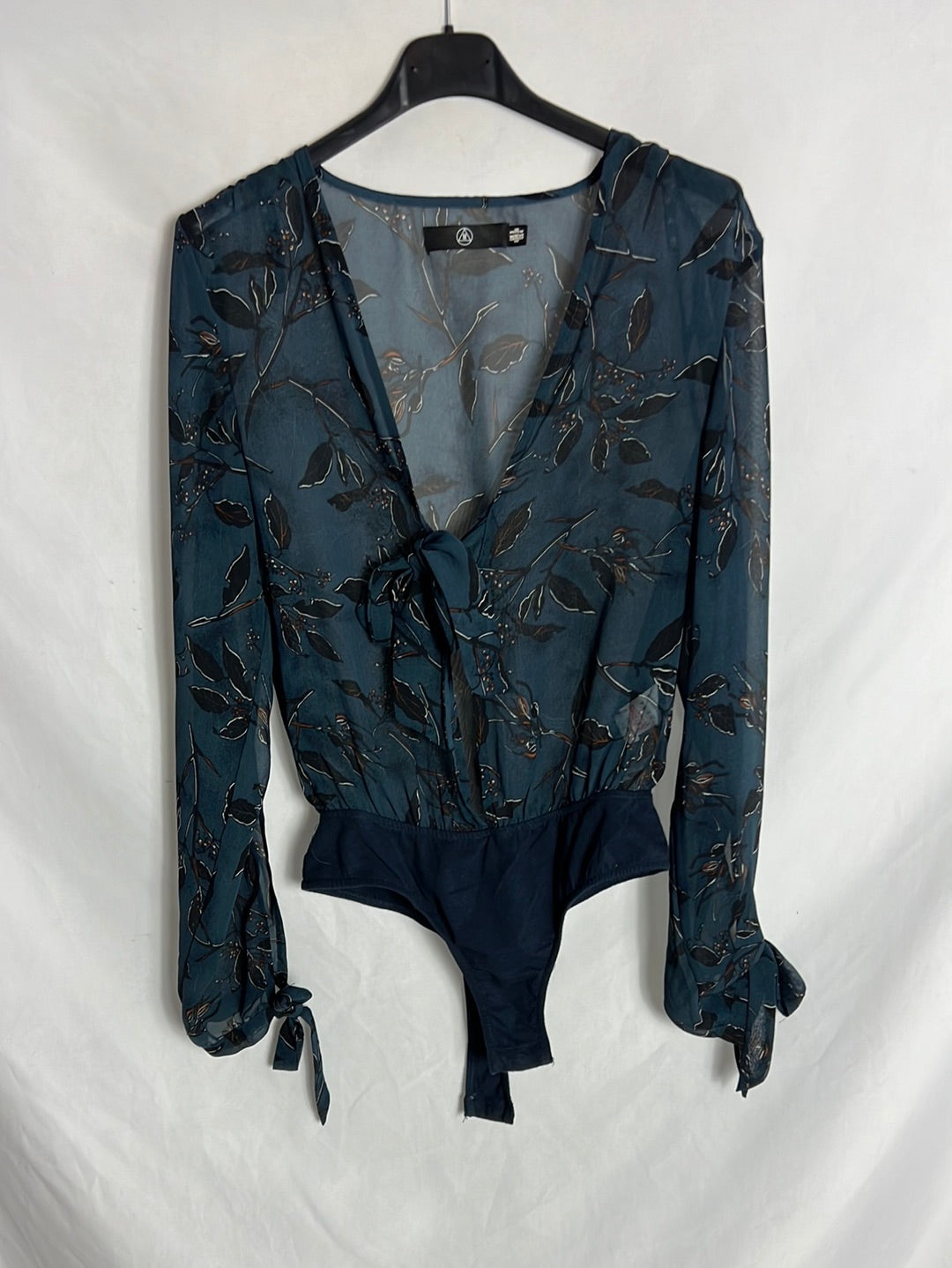 OTHERS. Blue printed bodysuit with bow neckline. TS