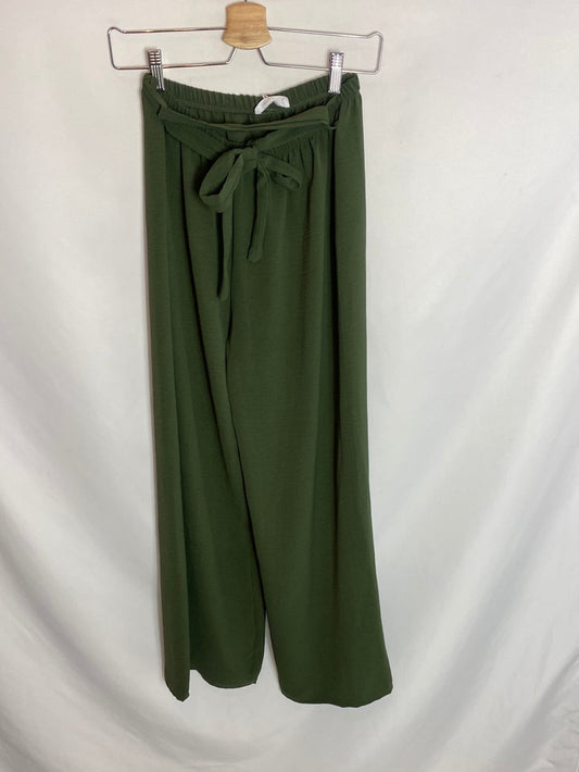 SOMETHING PRETTY. Green pants with a bow. You