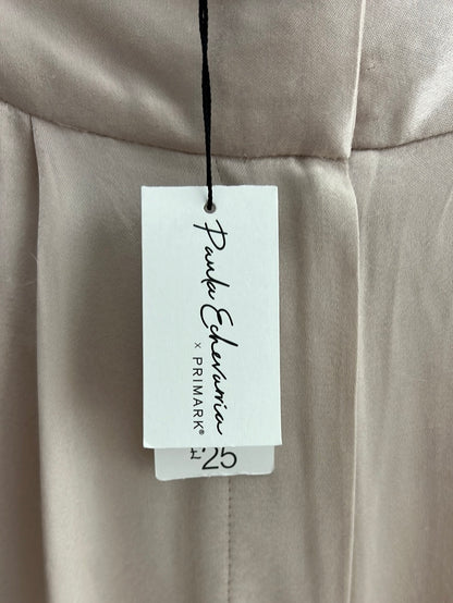 PRIMARK. Pantalones beige satinados. T 38