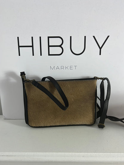 OTRAS. Bolso de mano de piel doble textura