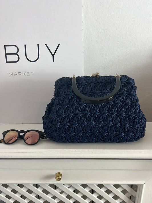 OTRAS. Bolso flores croché