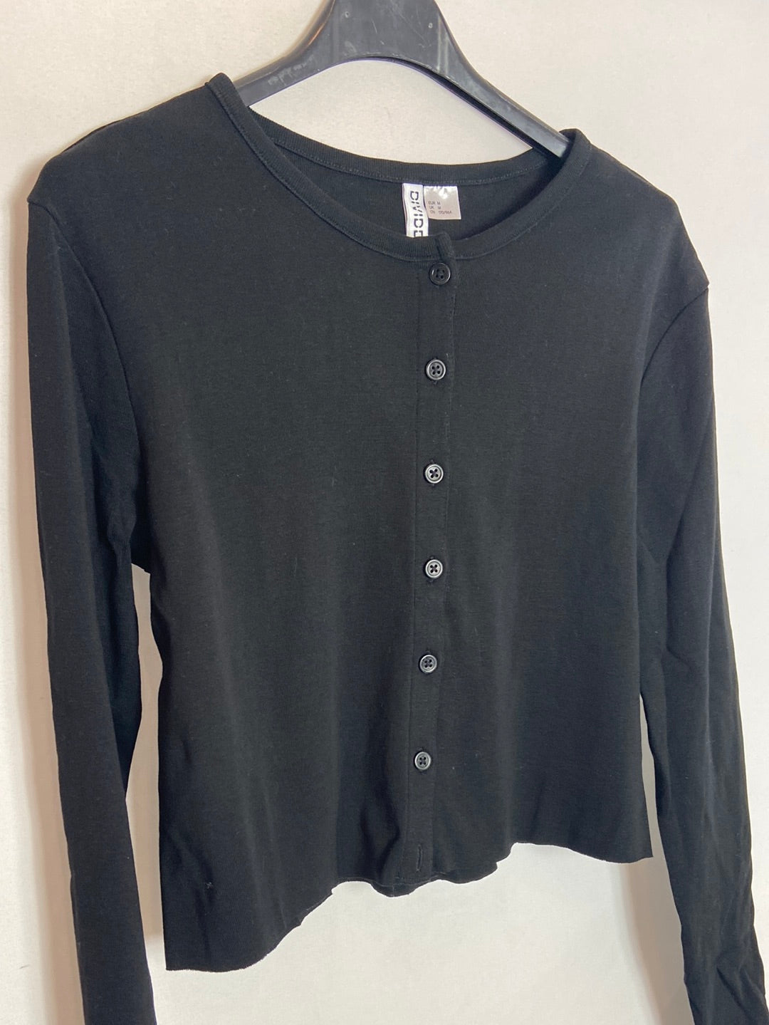 H&M. Cárdigan negro corto. T.M