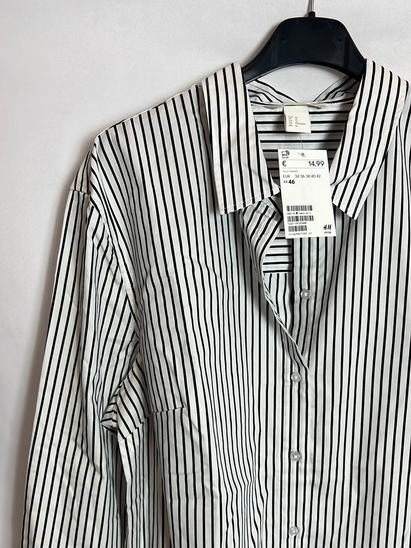H&M. Blusa blanca rayas negras. T 46