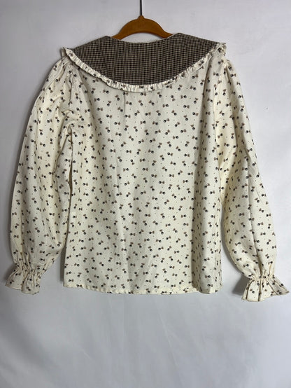 LOLA LIKES. Light beige floral blouse. Size 6 years.