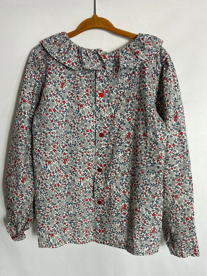 OTRAS. Blusa flores mini azules y rojas. T 6 años
