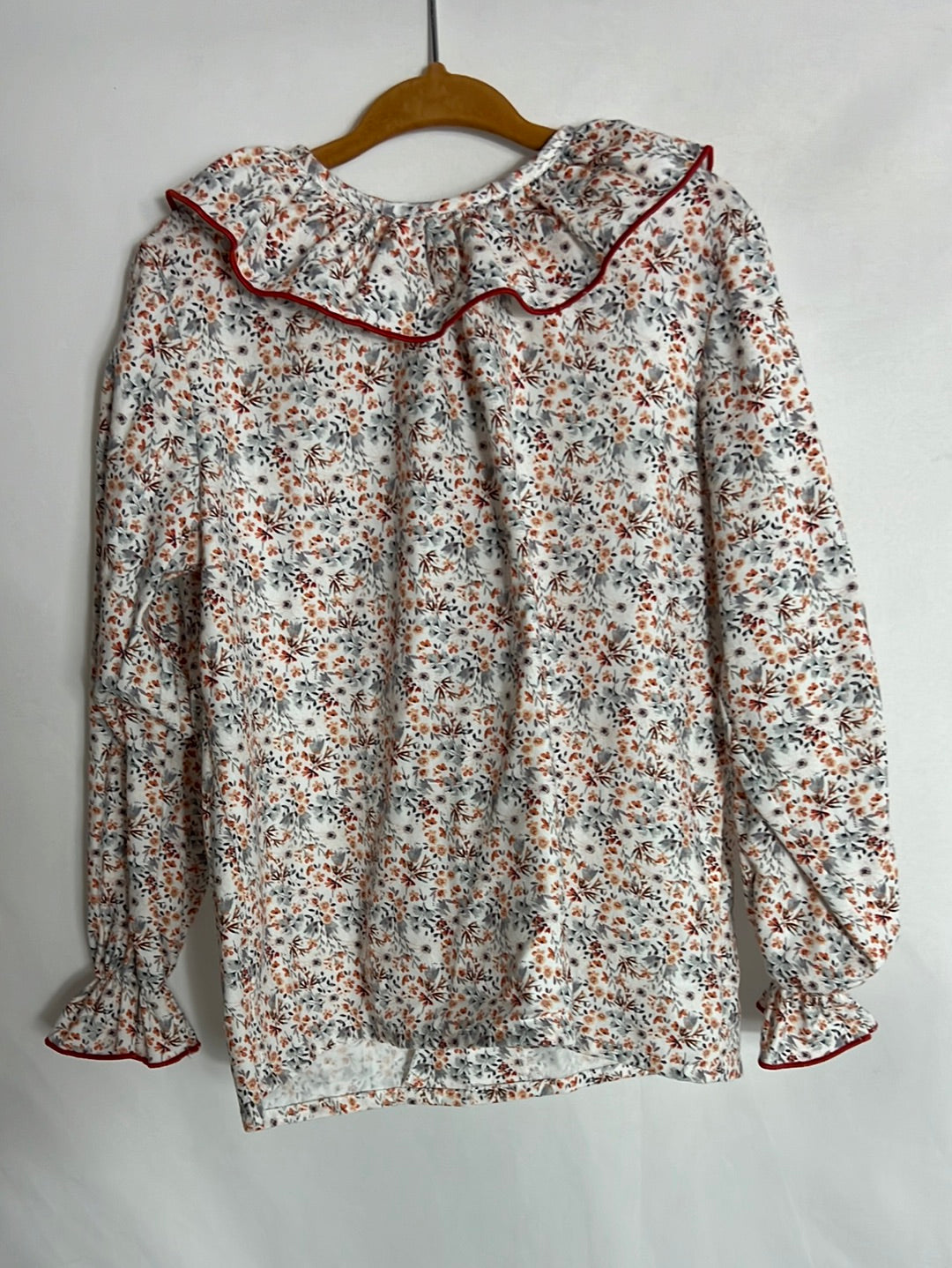 REGINA FOR KIDS. Blusa flores mini tonos naranjas. T 6 años