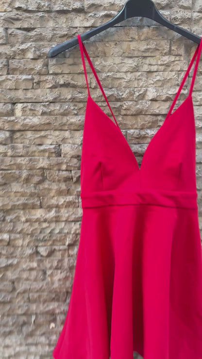 ZARA. Short red dress with brooch detail on the back. TS