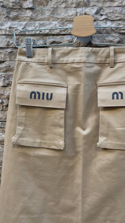 MIU MIU. Falda midi bolsillos T.m