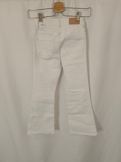 ZARA. White flared trousers, size 9 years