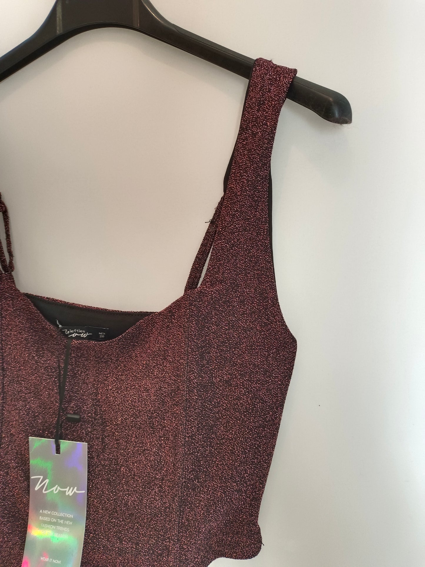 LEFTIES. Top negro y rosa purpurina T.s