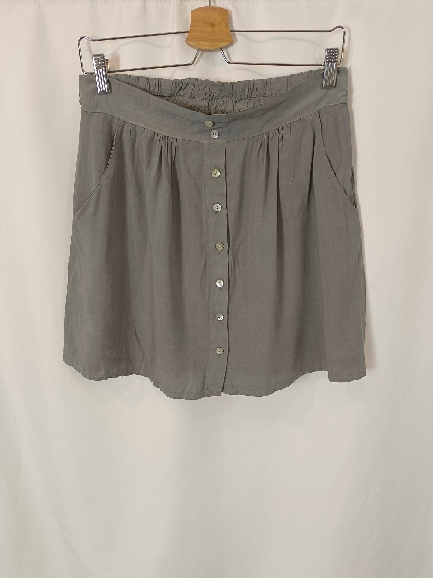 OTHERS. Short green buttoned skirt YOUR(S)