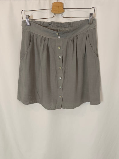 OTHERS. Short green buttoned skirt YOUR(S)