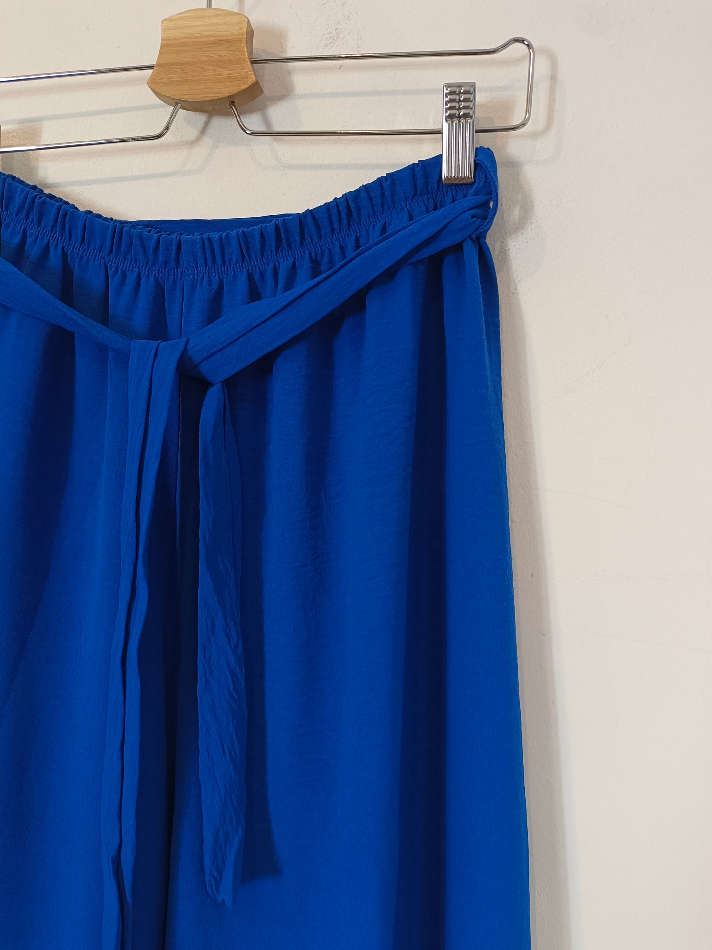 OTHERS. Blue wide-legged trousers with bow Your(s)