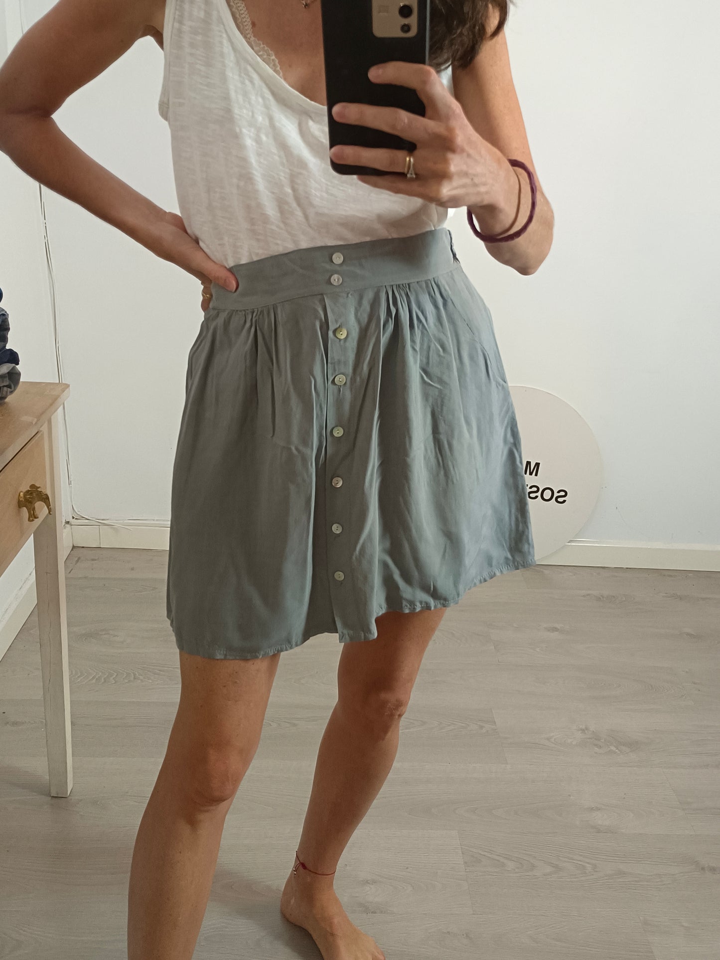 OTHERS. Short green buttoned skirt YOUR(S)