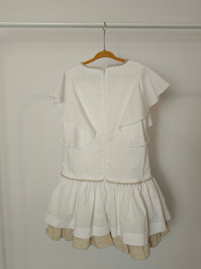 MIRANDA ES COSA DEN NIÑOS. Vestido  blanco detalle beige T.8 años